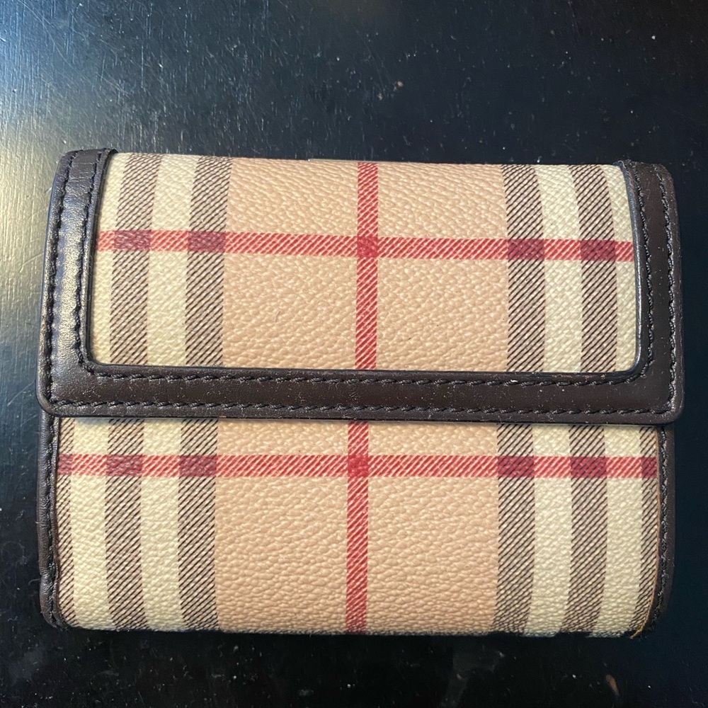 Burberry Women’s Wallet with change purse.